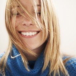 Young woman, eyes closed, happy